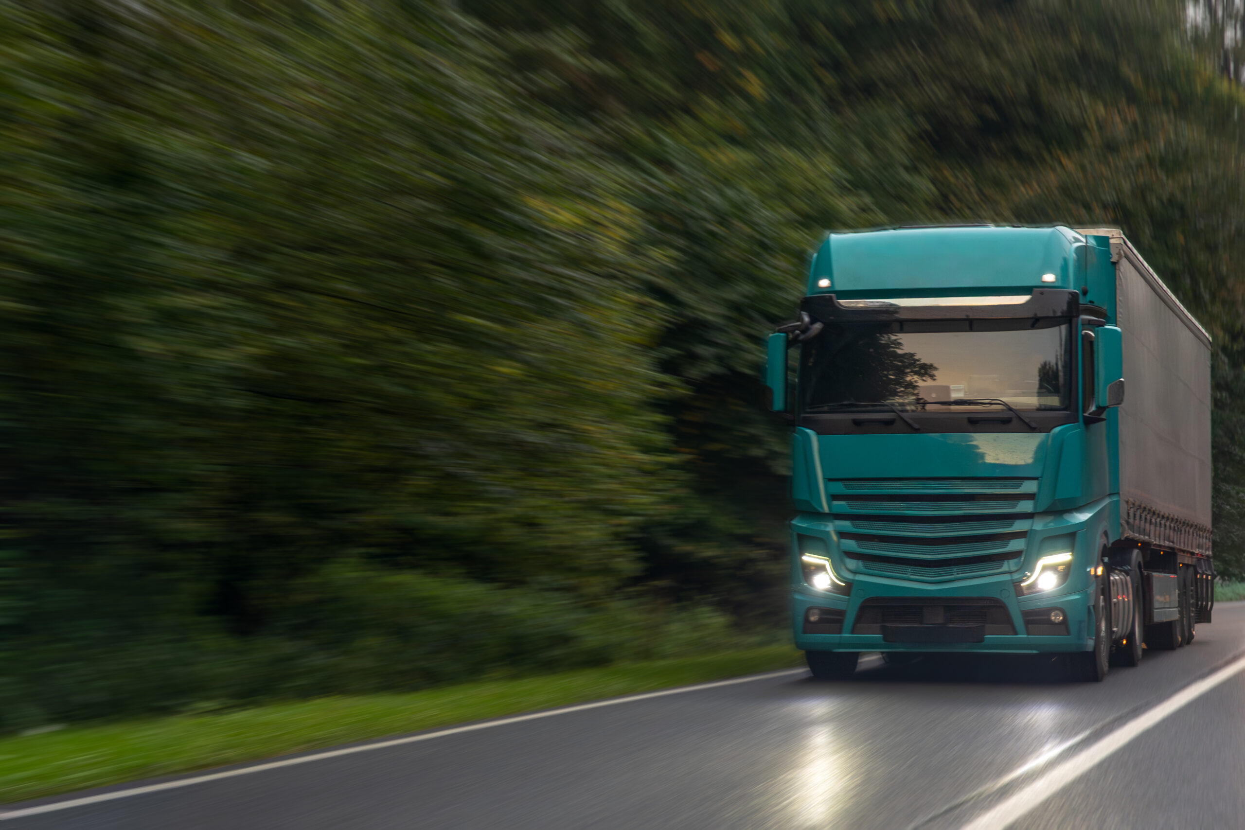 Road freight transportation truck on route